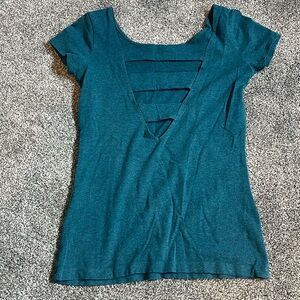 Super soft teal t-shirt with cut out back! Gently used. In perfect condition!